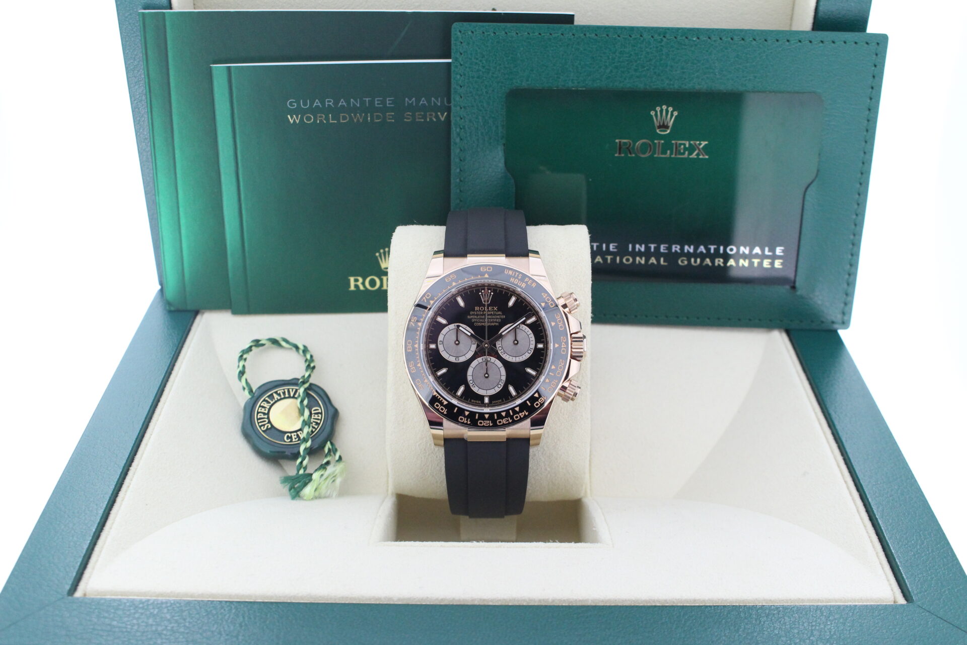 Rolex Daytona Everose Gold 126515LN in it's box with booklets, warranty card and green swing tag
