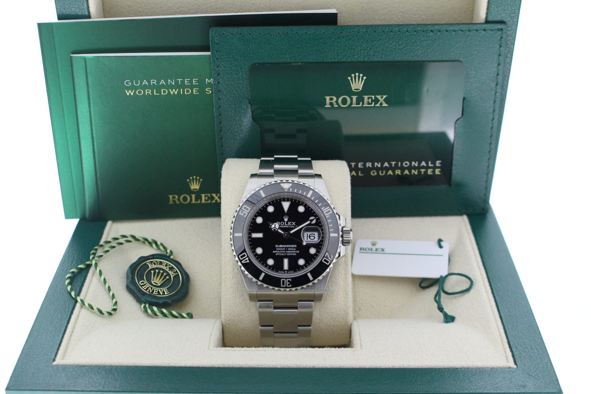 Rolex Submariner Date 126610LN in it's box with booklets, warranty card and both swing tags
