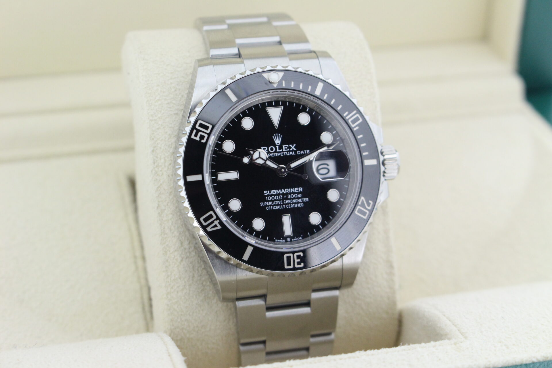 Rolex Submariner Date 126610LN facing towards the right to show the left angle