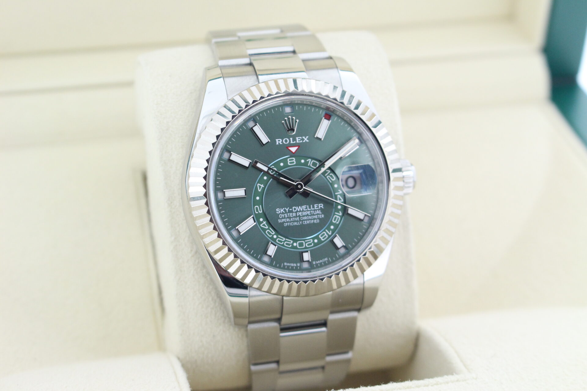 Rolex Sky-dweller 336934 Green Dial facing towards the right to show the left angle
