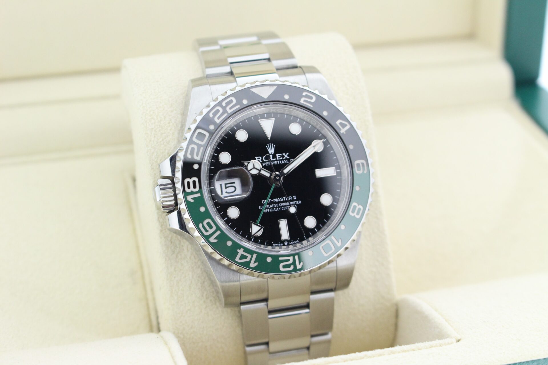 Rolex GMT Master II Sprite 126720GTNR facing towards the right to show the left angle