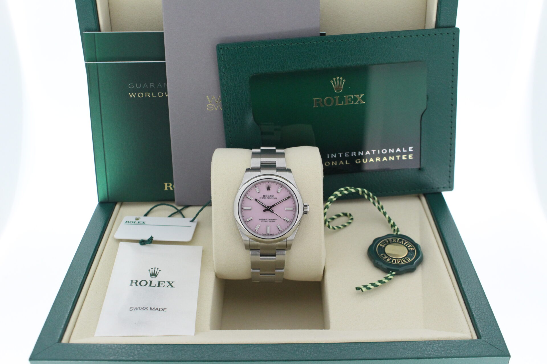 Rolex Oyster Perpetual Candy Pink Dial 277200 in it's box with both swing tags, booklets, warranty card and original purchase receipt