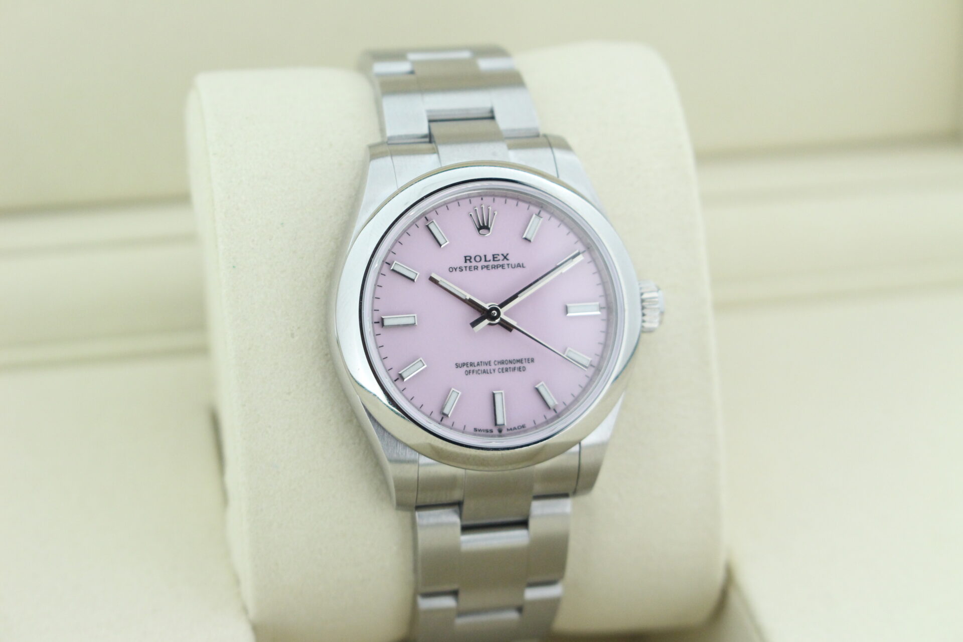 Rolex Oyster Perpetual Candy Pink Dial 277200 facing towards the right to show the left angle