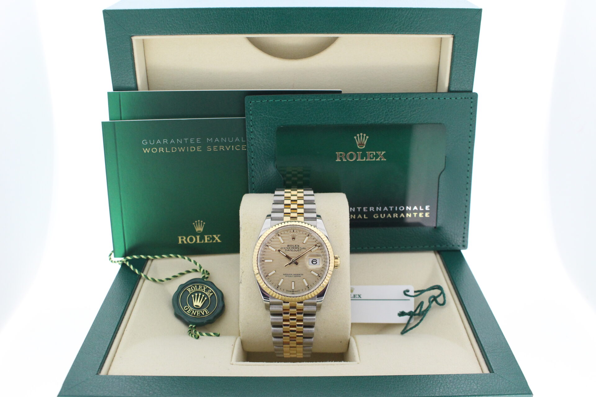 Rolex Datejust 36 Motif 126233 in it's box with both swing tags, booklets and warranty card dated April 2023