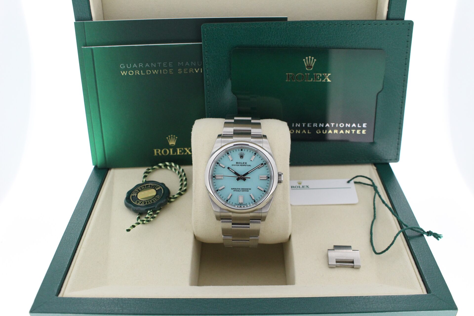 Rolex Oyster Perpetual 36 Tiffany 126000 in it's box with both swing tags, booklet and warranty card