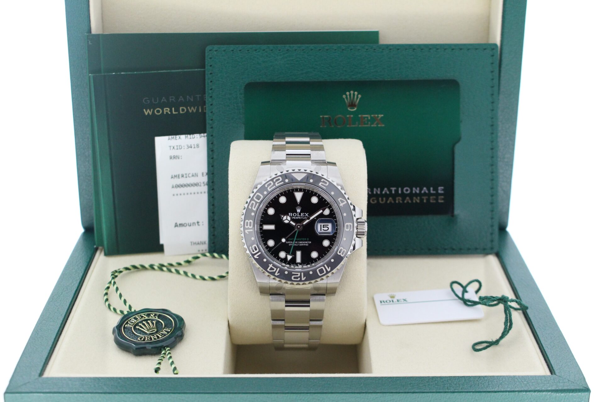 Rolex GMT Master II Bruce Wayne 126710GRNR in it's box with both swing tags, booklets and warranty card