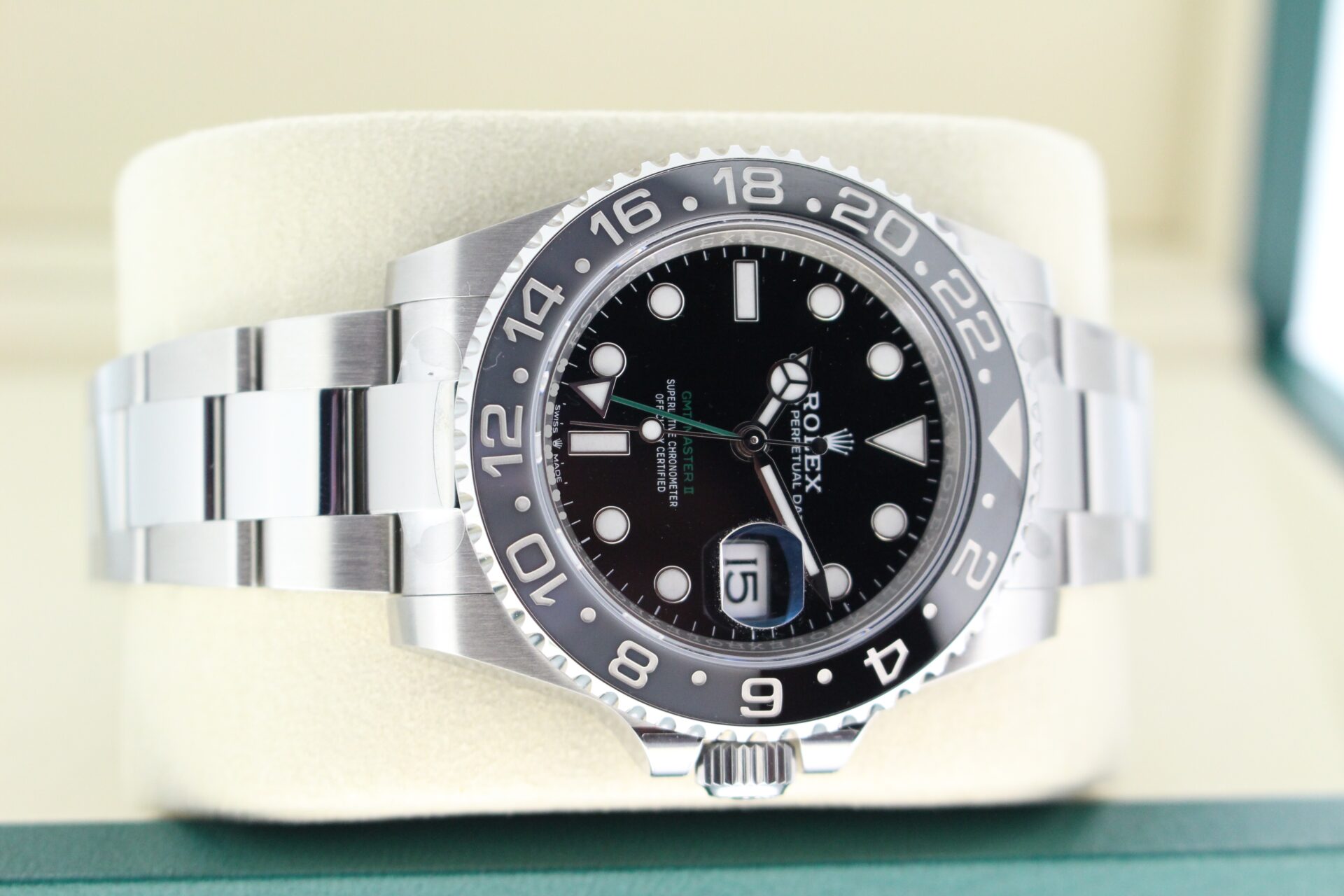 Rolex GMT Master II Bruce Wayne 126710GRNR on it's side
