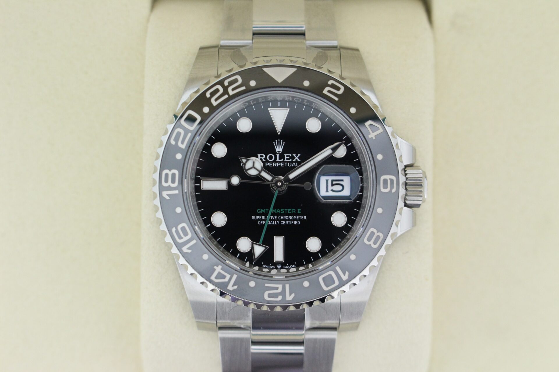 Close up of Rolex GMT Master II Bruce Wayne 126710GRNR watch face