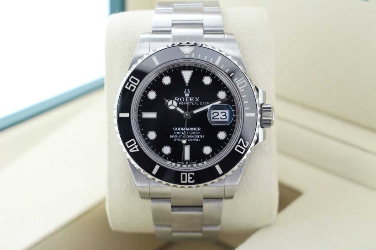 Rolex Submariner Date on its watch cushion face on