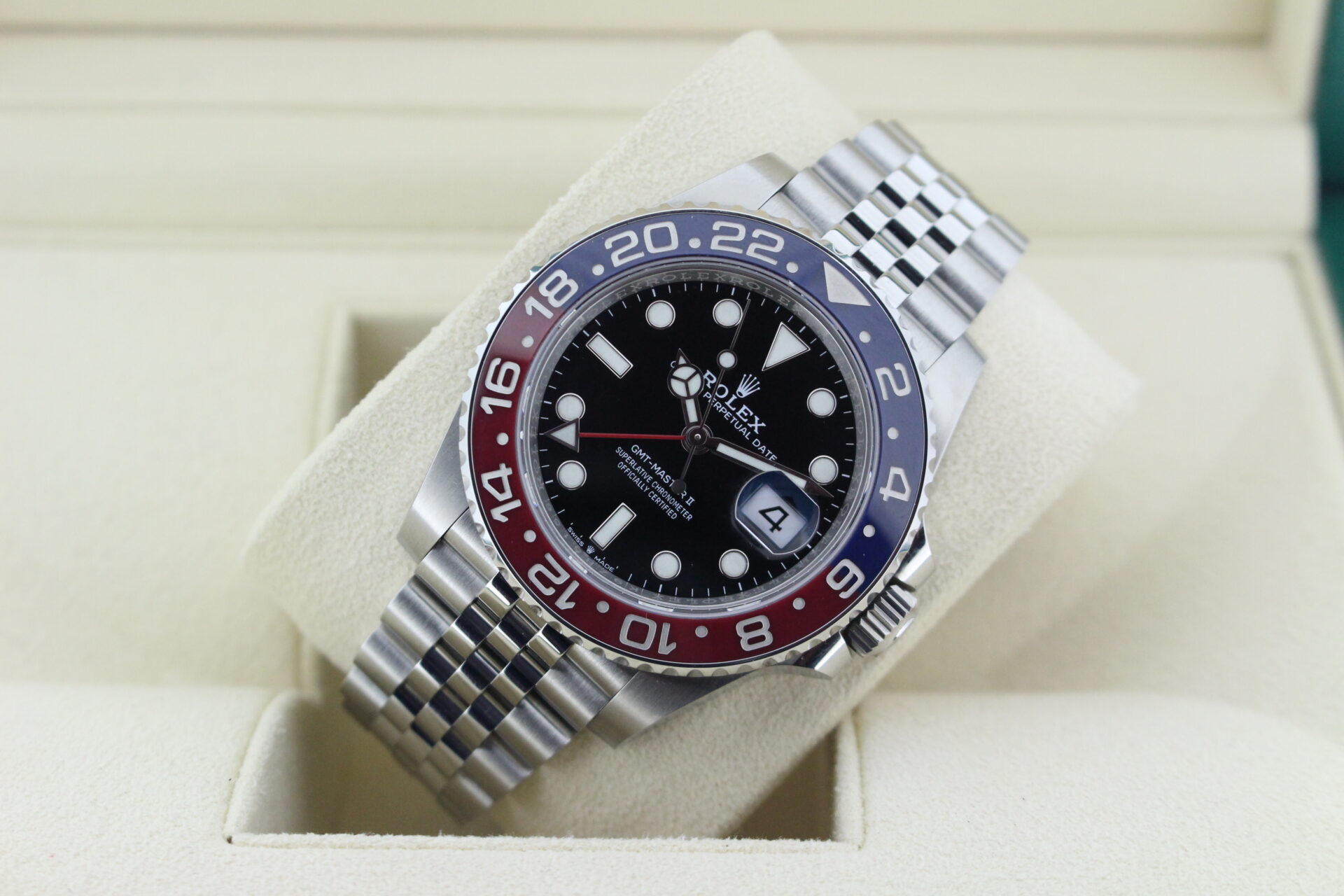 Rolex GMT Master II Pepsi 1261710BLRO tilted in it's box