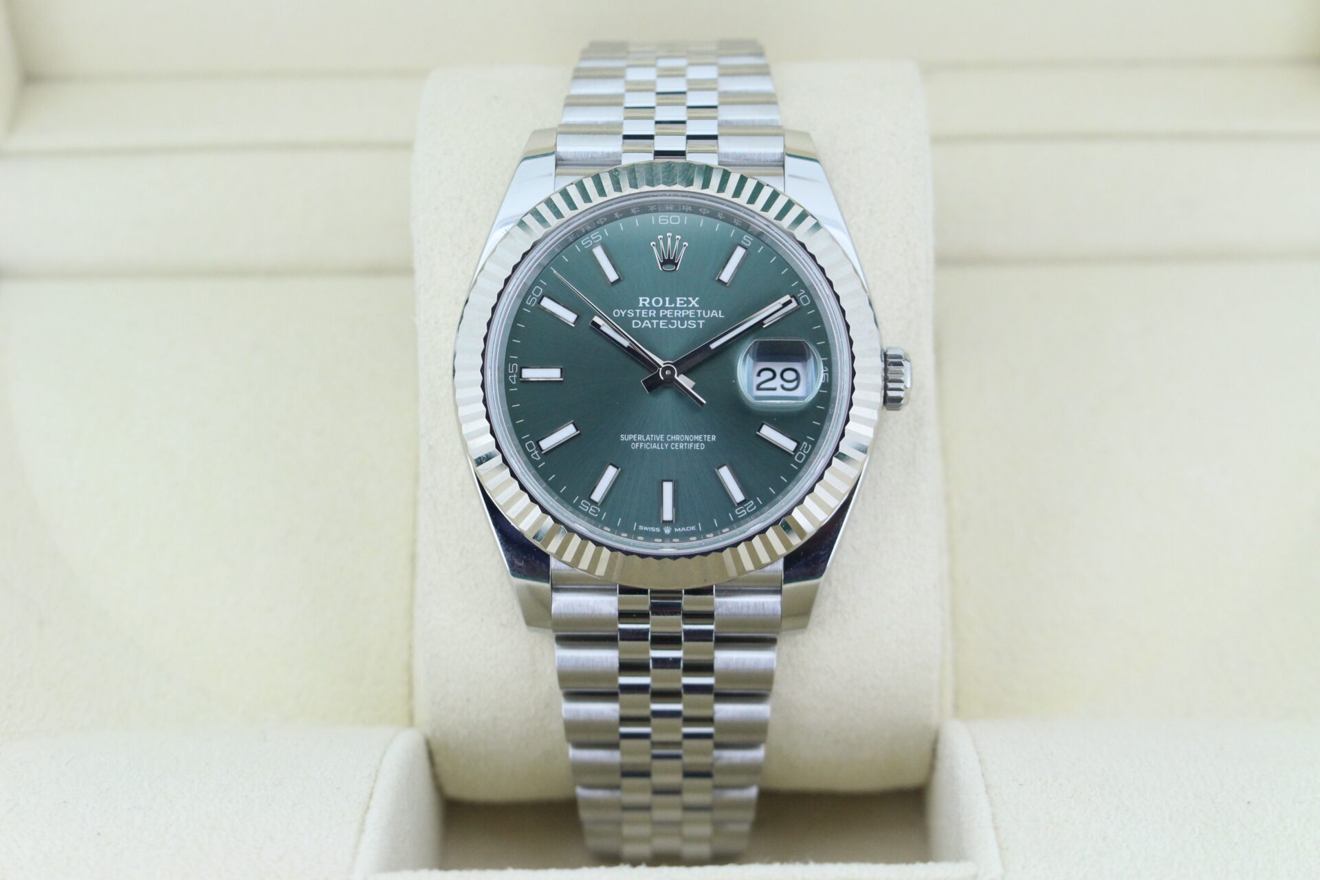 Straight on view of a mint green rolex datejust 41mm fluted bezel and jubilee bracelet