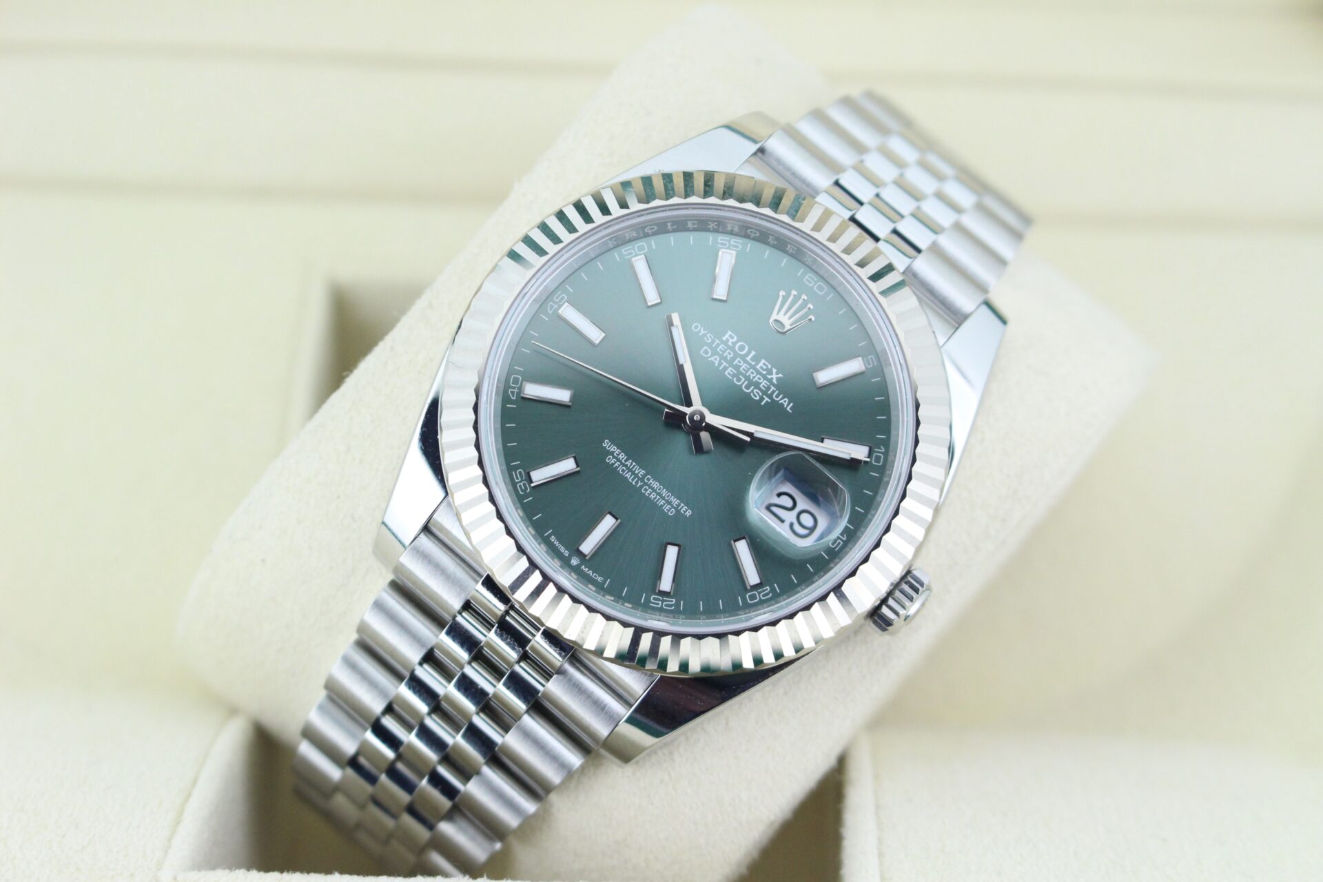 Rolex DJ41 at an angle with light reflecting on the dial