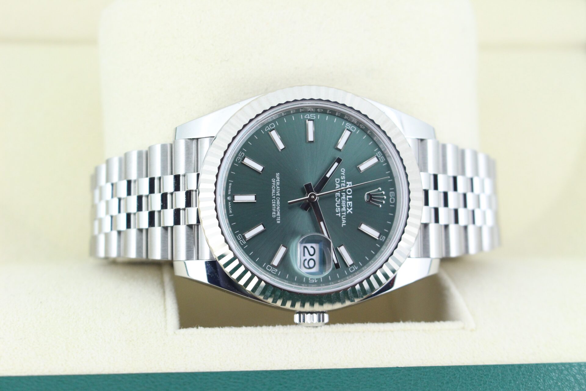 Mint Green dial datejust laid on its side