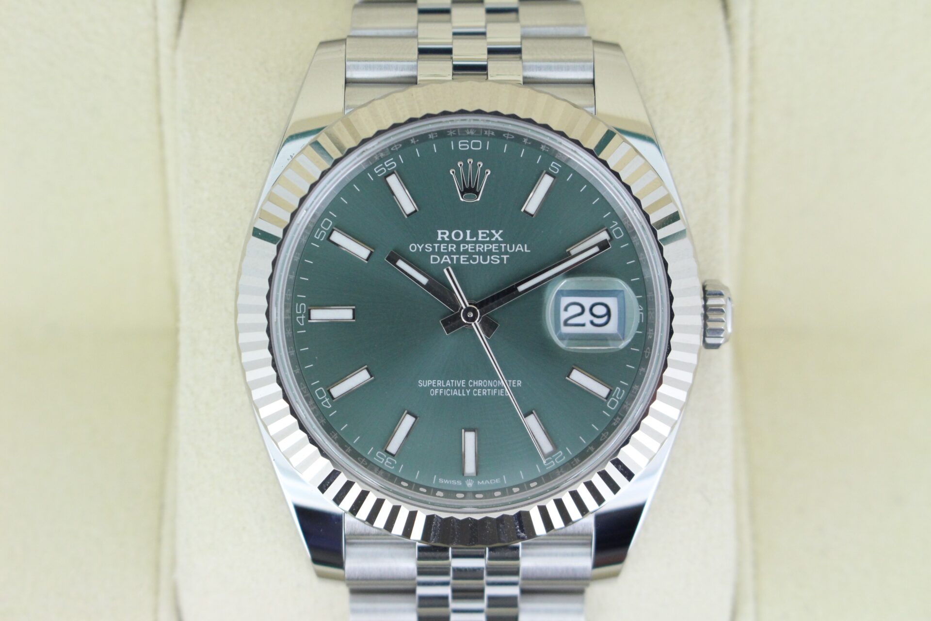 Close up of the mint green dial fluted bezel on a datejust 41