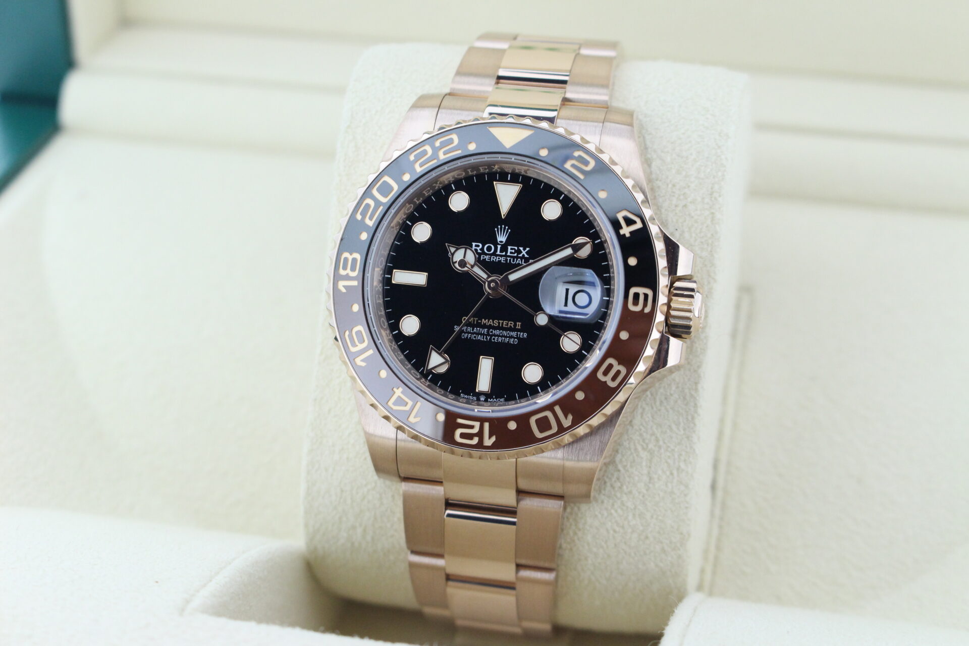 Rolex GMT Master II Full Everose Rootbeer 126715CHNR facing towards the left to show the right angle