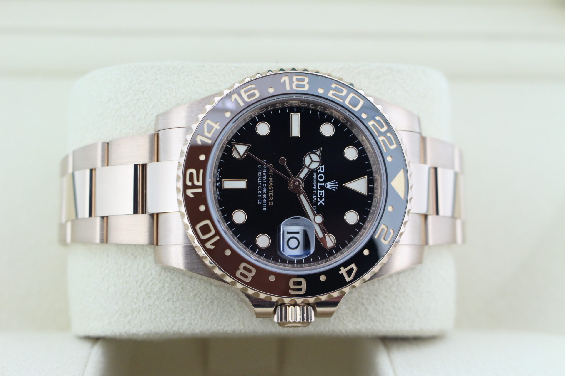 Rolex GMT Master II Full Everose Rootbeer 126715CHNR on it's side