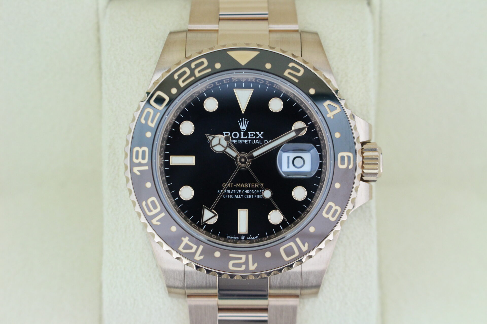 Close up of Rolex GMT Master II Full Everose Rootbeer 126715CHNR watch face
