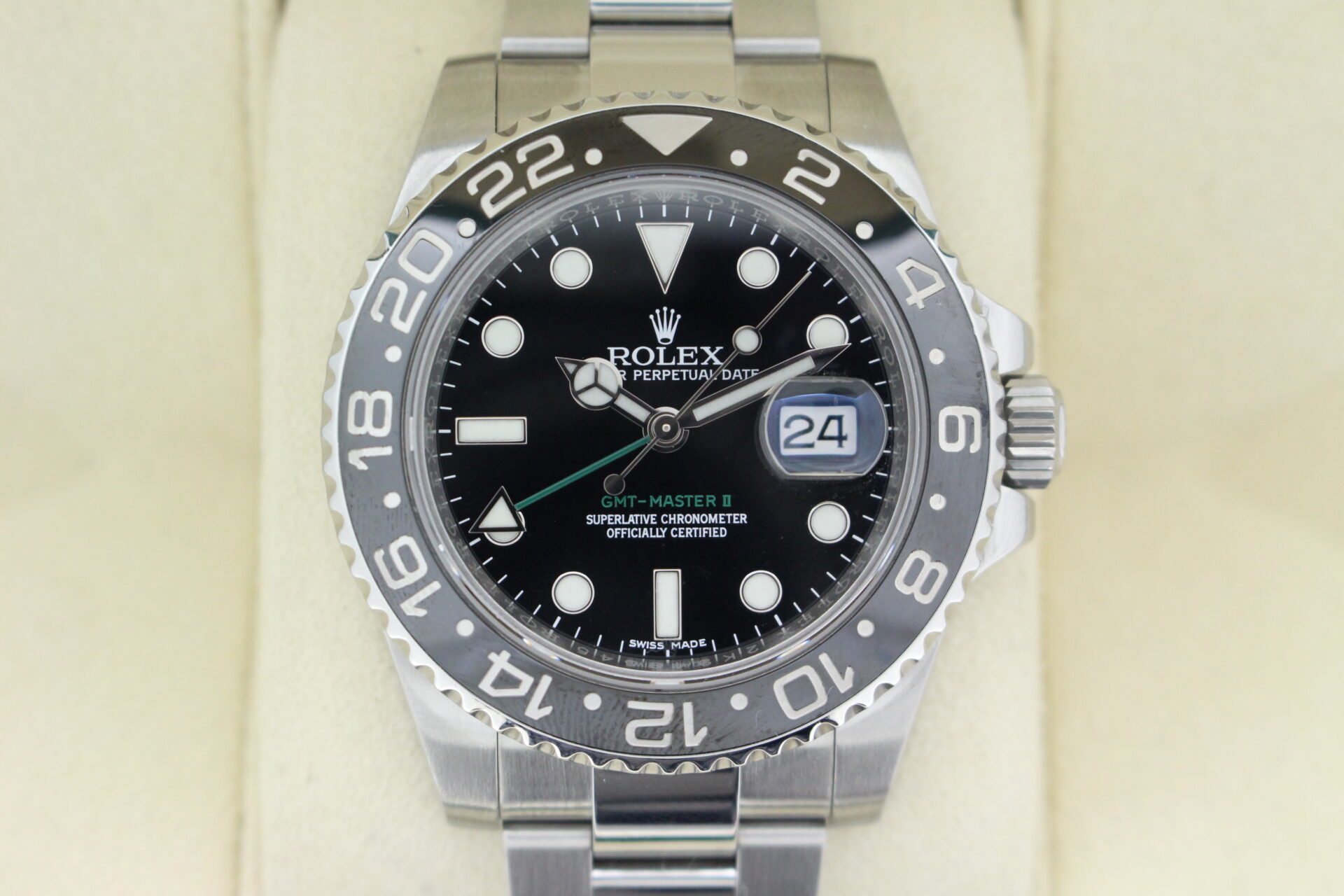 Close up of Rolex GMT Master II Black 116710LN watch face
