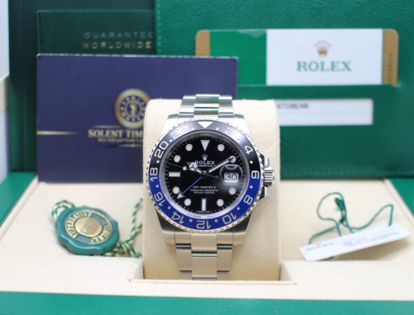 Rolex GMT Master II in its box with all original accessories on show