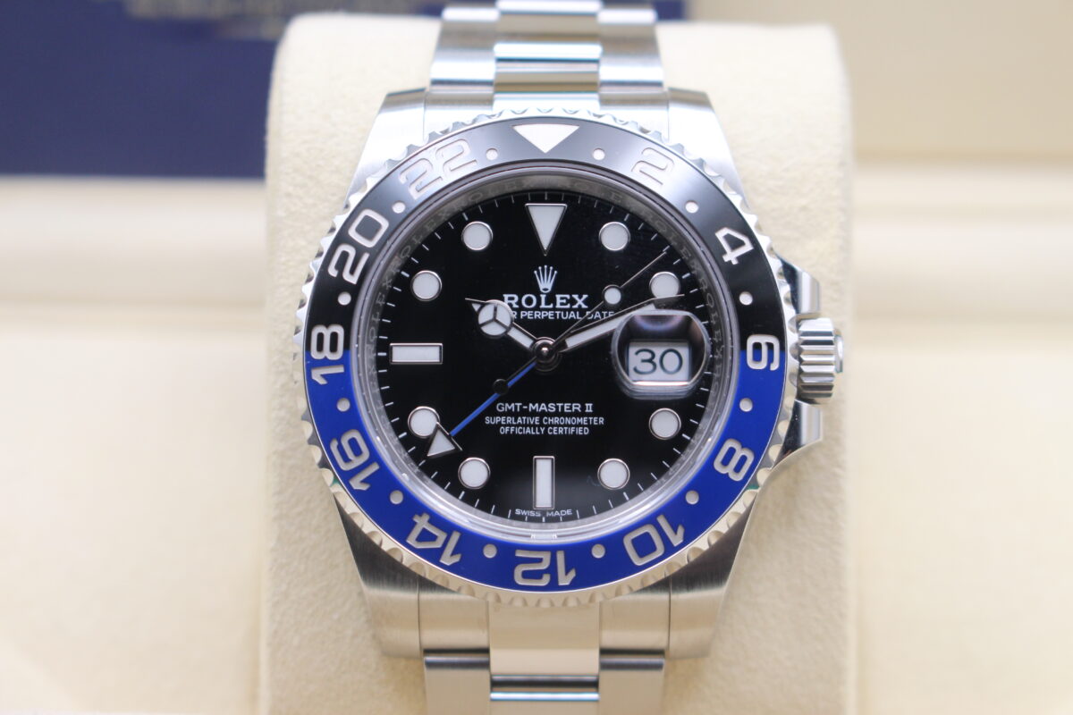 Rolex GMT Master II Batman 116710BLNR sat upright on its cushion