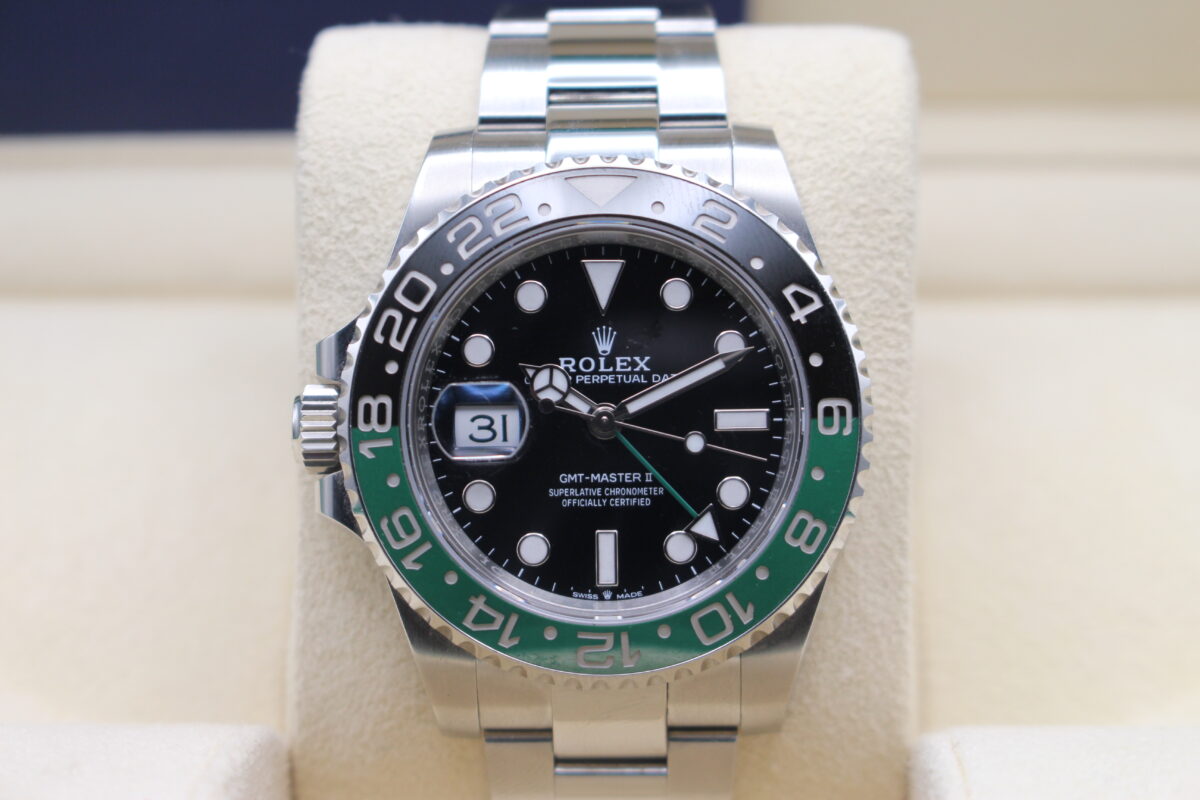 A Rolex Sprite on a Oyster Bracelet, upright in its box