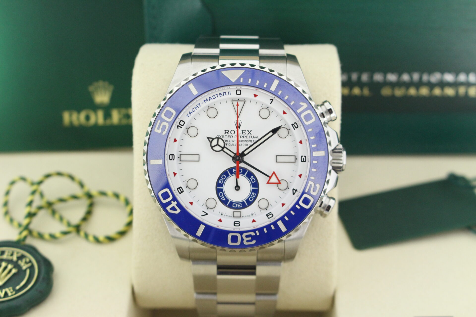 Close up of Rolex Yacht-master II 126680 in it's box with both swing tags, booklets and warranty card