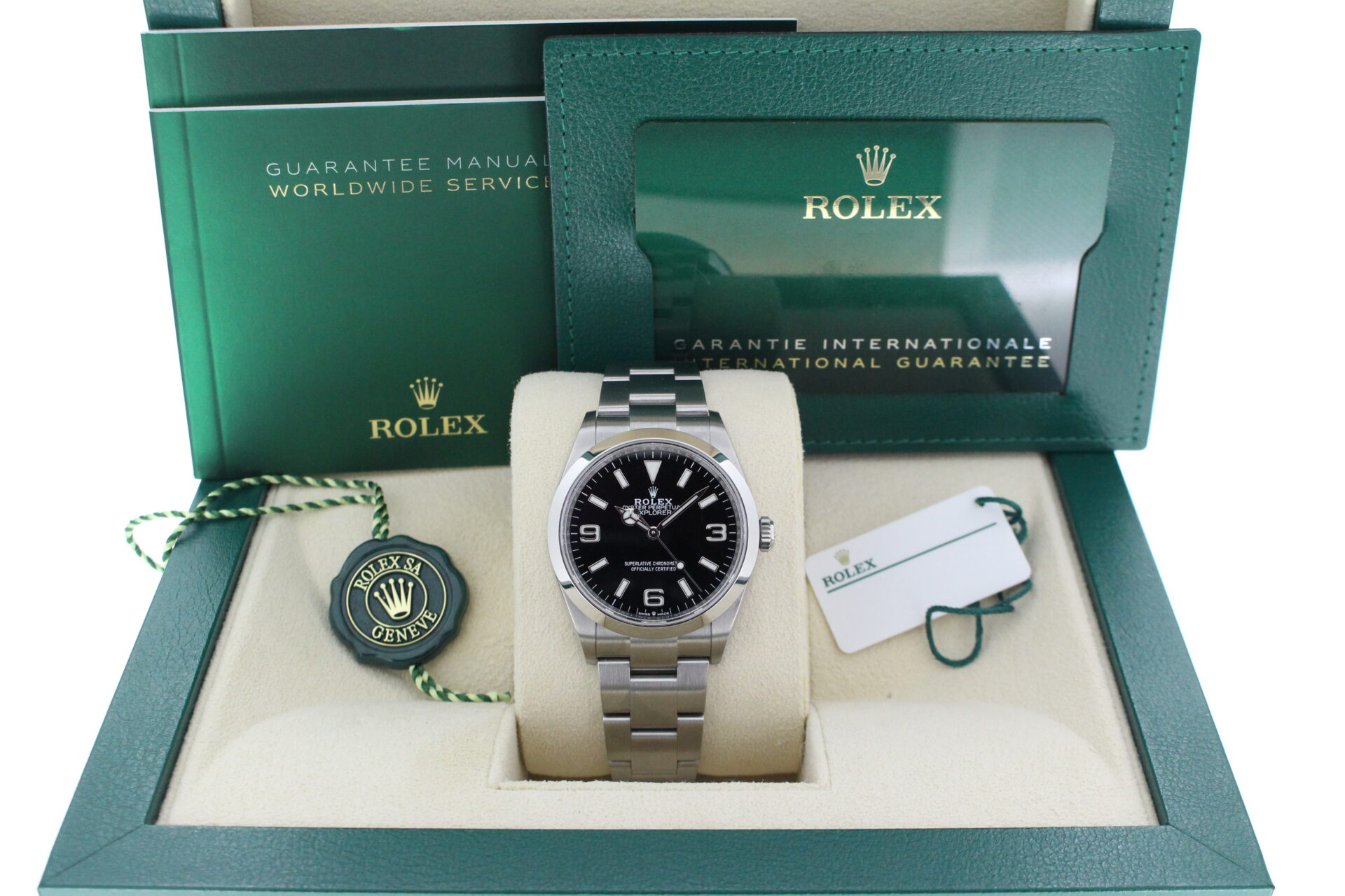 Rolex Explorer I 36mm 124270 in it's box with both swing tags, booklets and warranty card