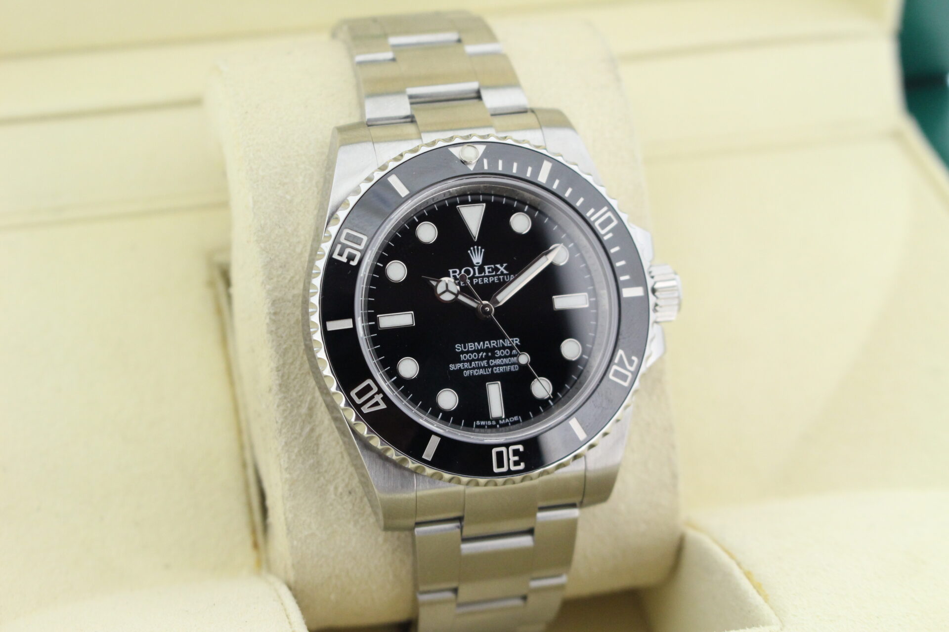 Rolex Submariner No Date 114060 facing towards the right to show the left angle