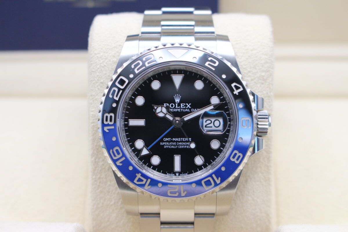 Rolex Batman displayed upright on its box cushion