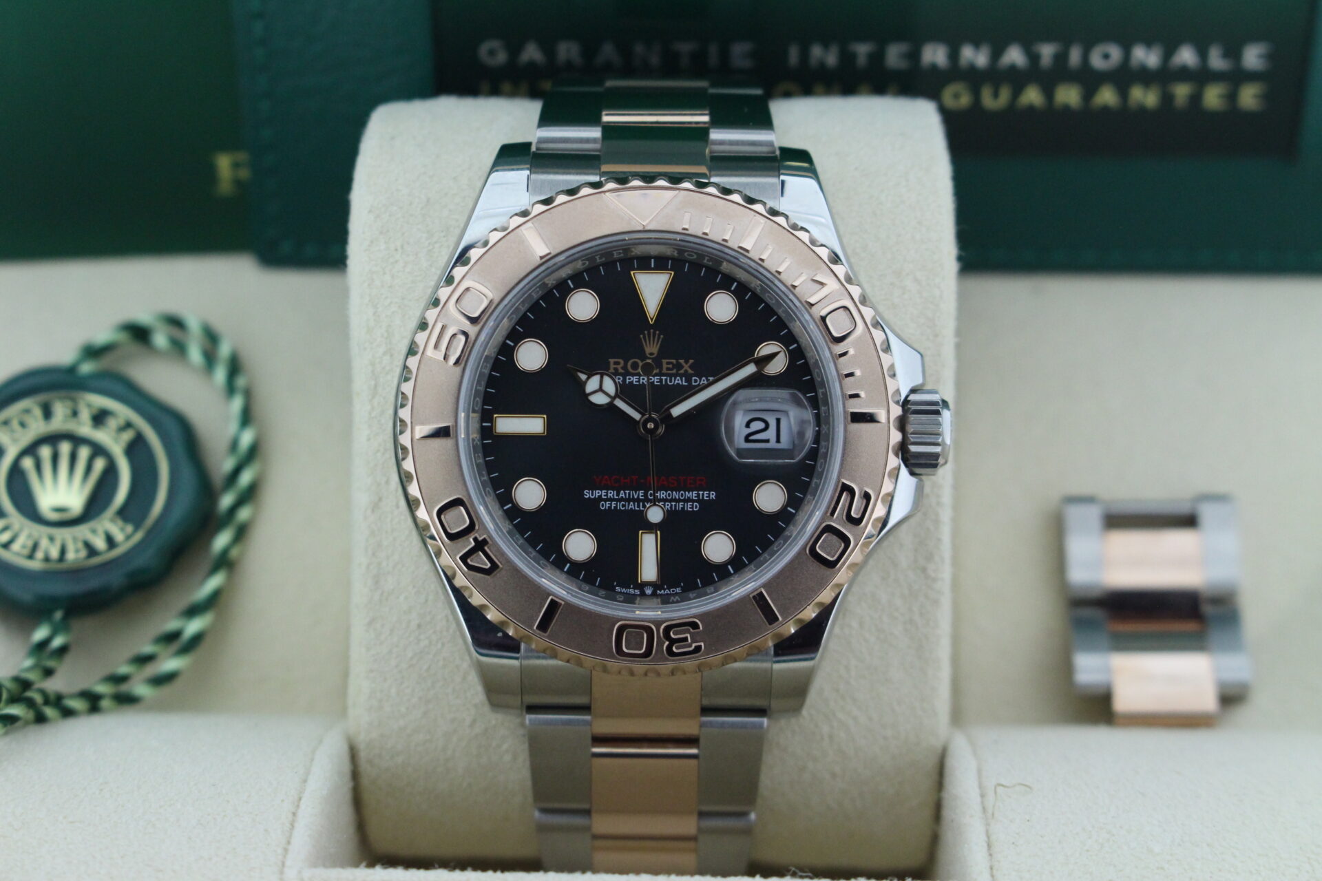 Close up of Rolex Yacht-Master 40 126621 Charcoal in it's box with green swing tag, booklets and warranty card