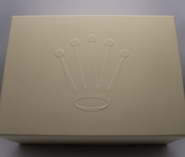 Rolex Outer Carboard box viewed from the front with the Rolex Crown