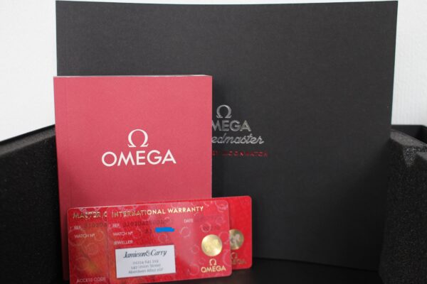 Omega Manual, warranty card and booklet