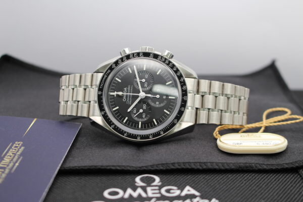 Omega Seamaster on top of an Omega box with swing tag