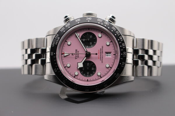 Tudor Black Bay Chrono Pink on its side sat on top of its box