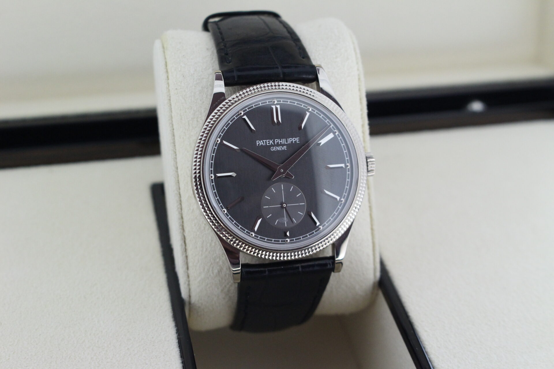 Patek Philippe Calatrava 6119G-001 facing towards the right to show the left angle