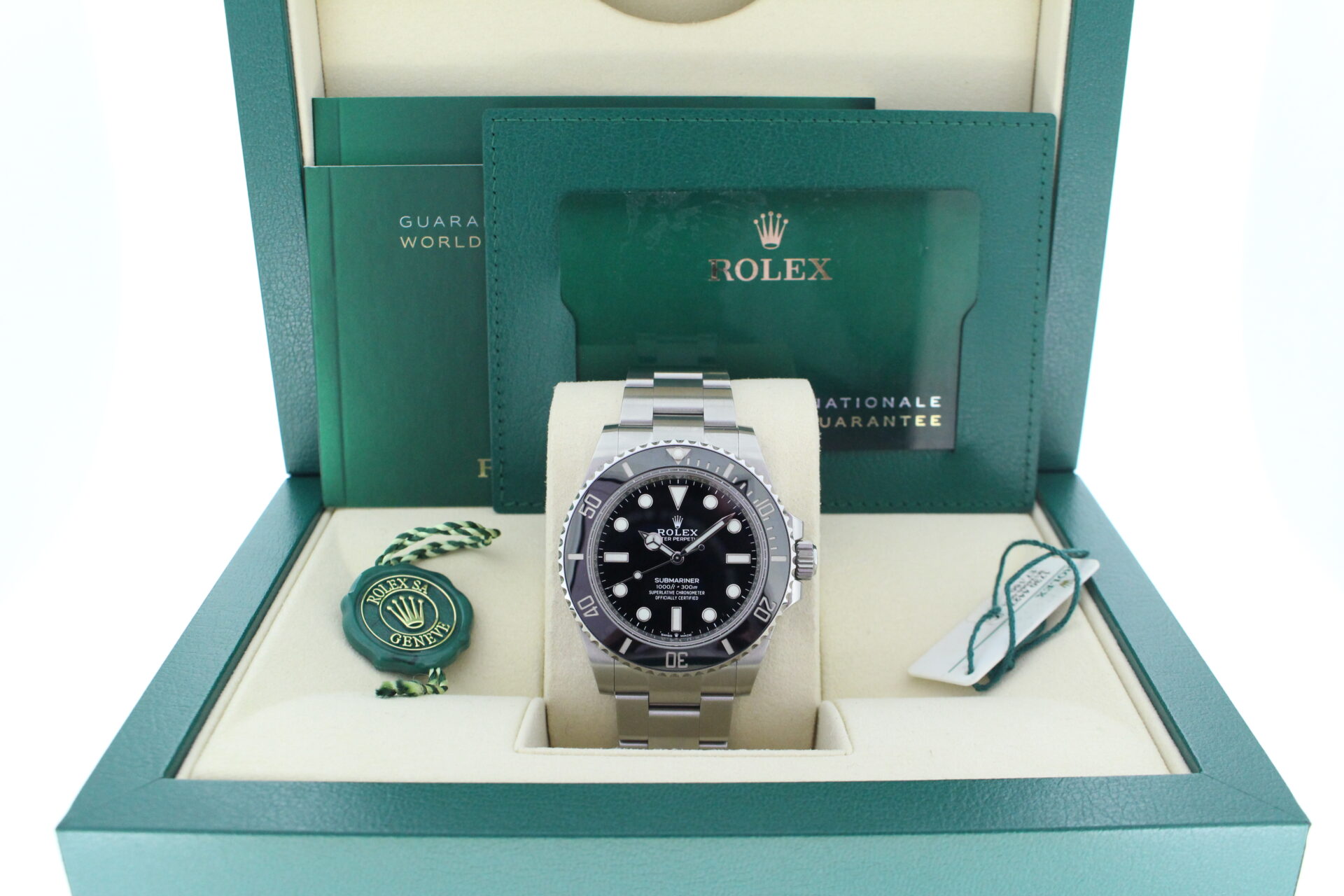 Rolex Submariner No Date 124060 in it's box with both swing tags, warranty card and booklets