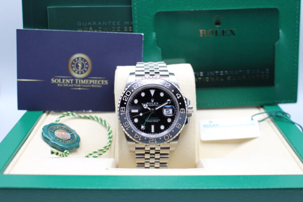 Rolex GMT Master II Bruce Wayne full set. Watch on display with all its accessories