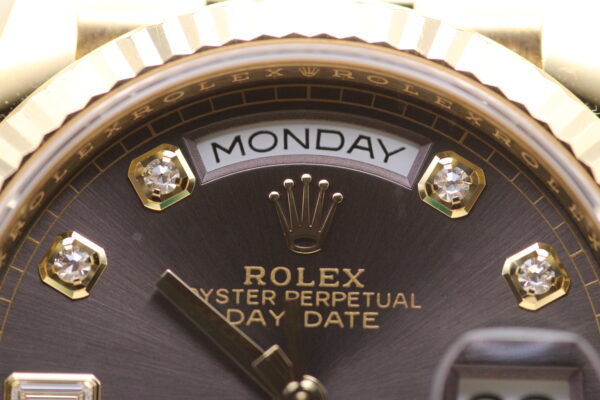 Rolex Day-Date with the date as Monday and diamonds from the dial on show