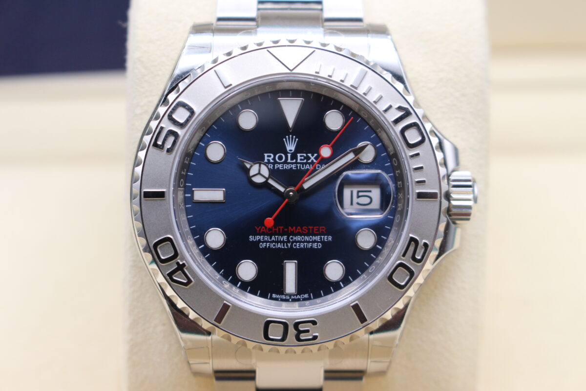 Rolex Yacht-Master 40 with a sunburst blue dial sat upright reading 10 past 10