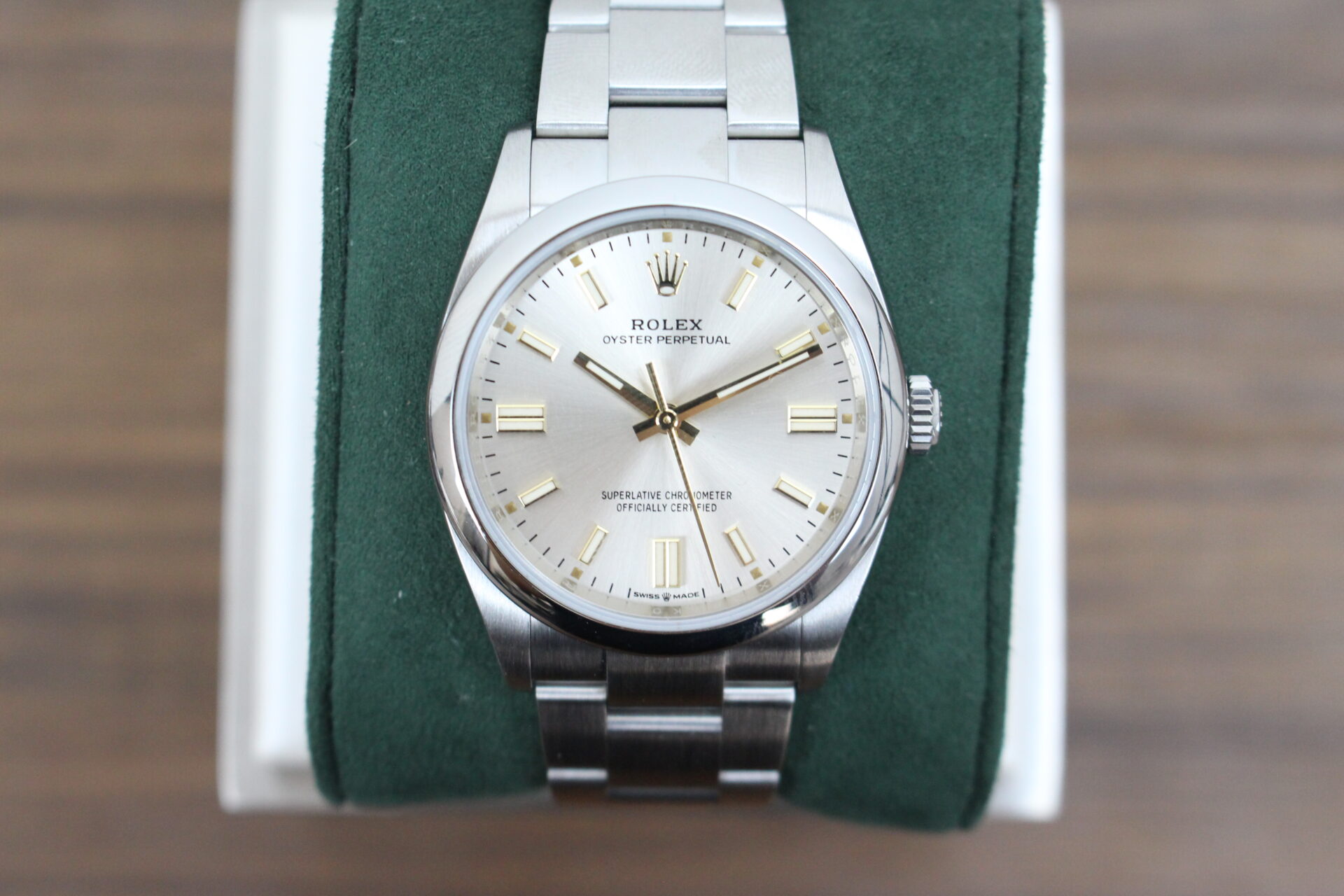 Rolex Oyster Perpetual 36 Silver 126000 on a green cushion