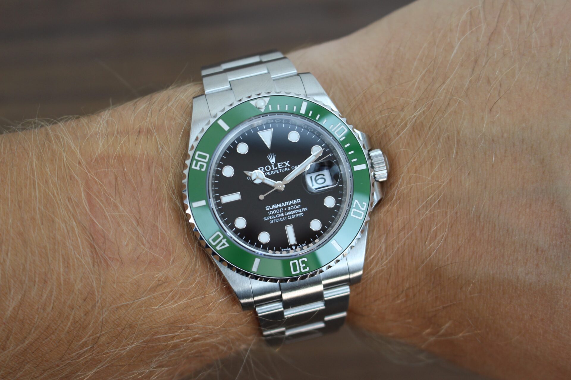 Wrist shot of a Rolex starbucks green bezel