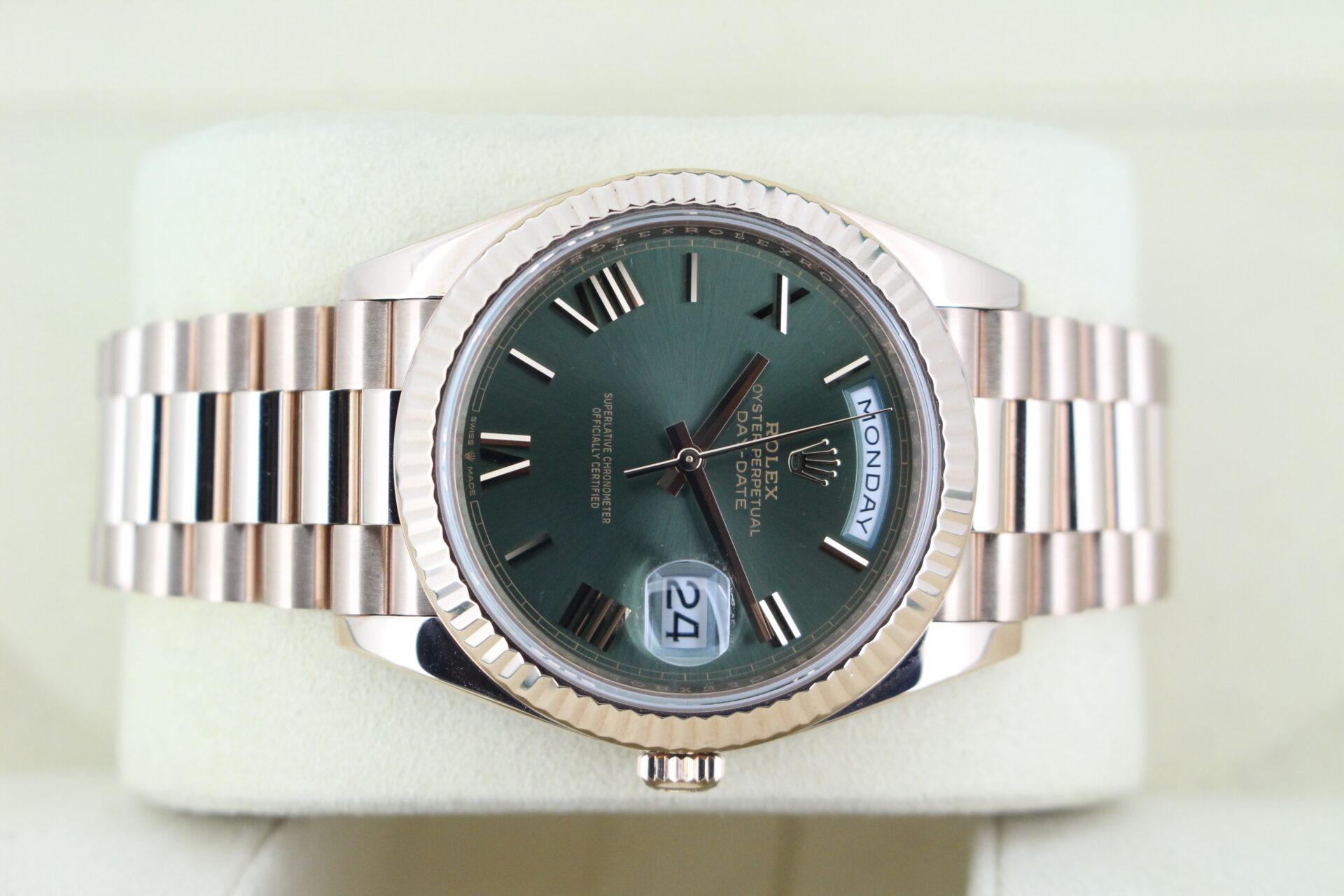 Rolex Day-Date 40 Rose Gold Olive 228235 on it's side
