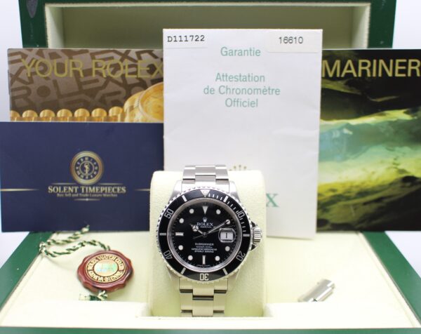 A Rolex Submariner with all its original accessories making a full set