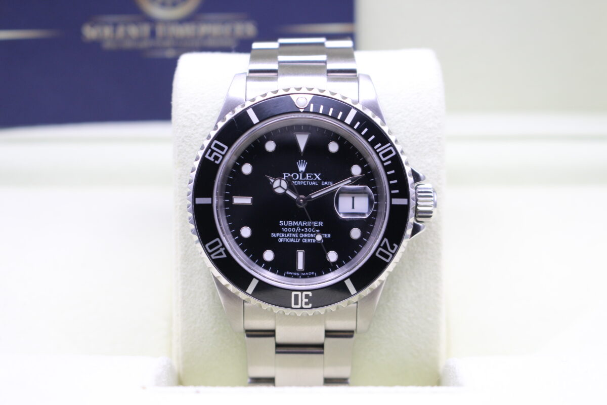 Pre-Ceramic Vintage Rolex Submariner sat upright on its cushion