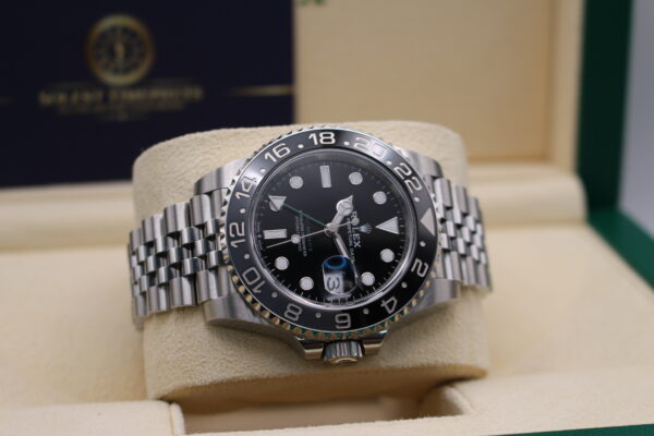 Rolex Bruce wayne laid on its side crown side facing down