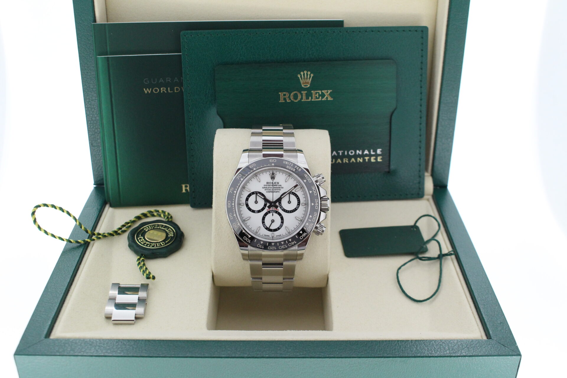 Rolex Daytona Panda 126500LN in it's box with both swing tags, booklets and warranty card