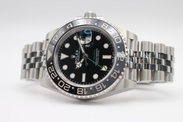 Rolex Bruce Wayne fitted on a jubilee bracelet displayed on a white background