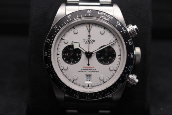 Close up of the white dial on a Tudor black bay chrono