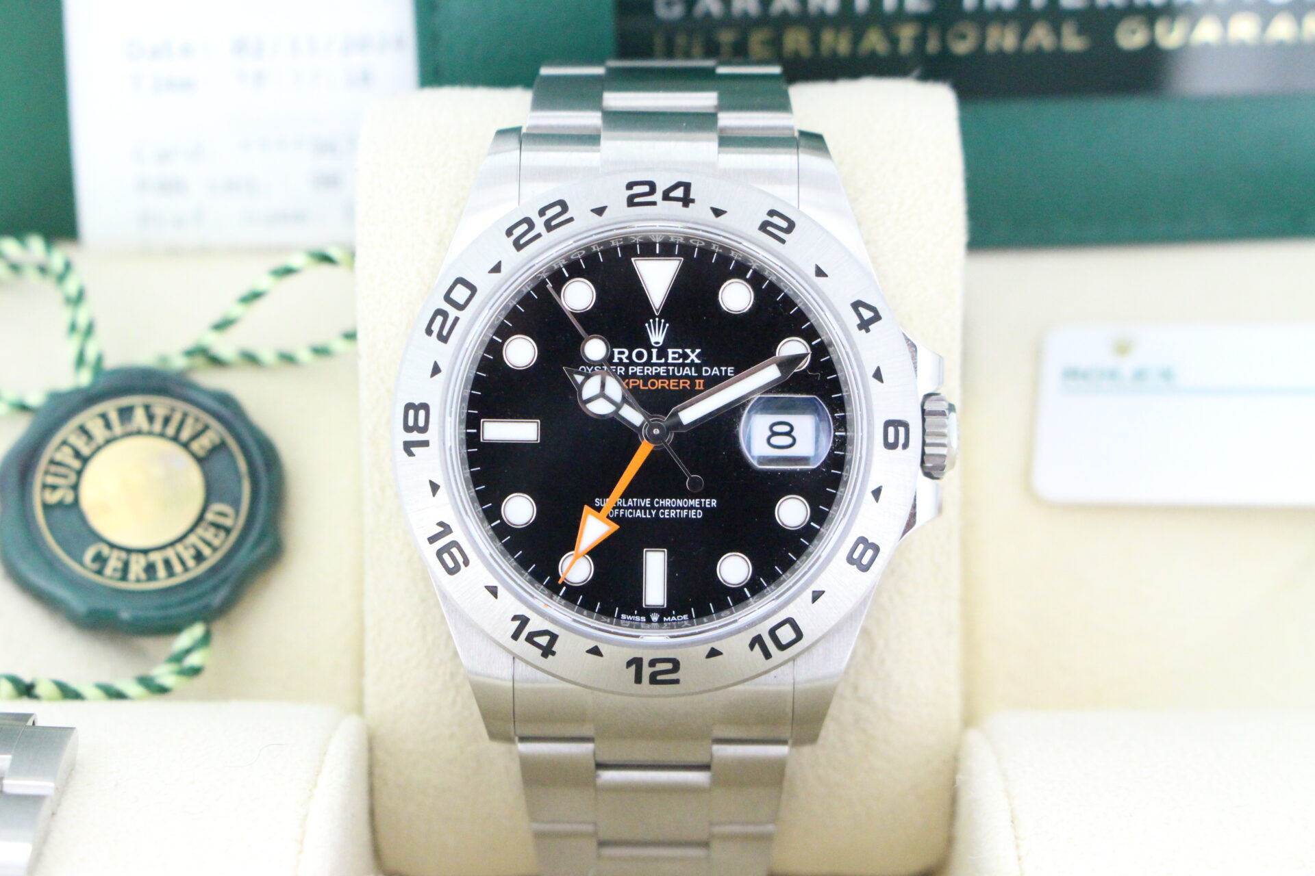 Close up of Rolex Explorer II 226570 in it's box with both swing tags, booklets and warranty card