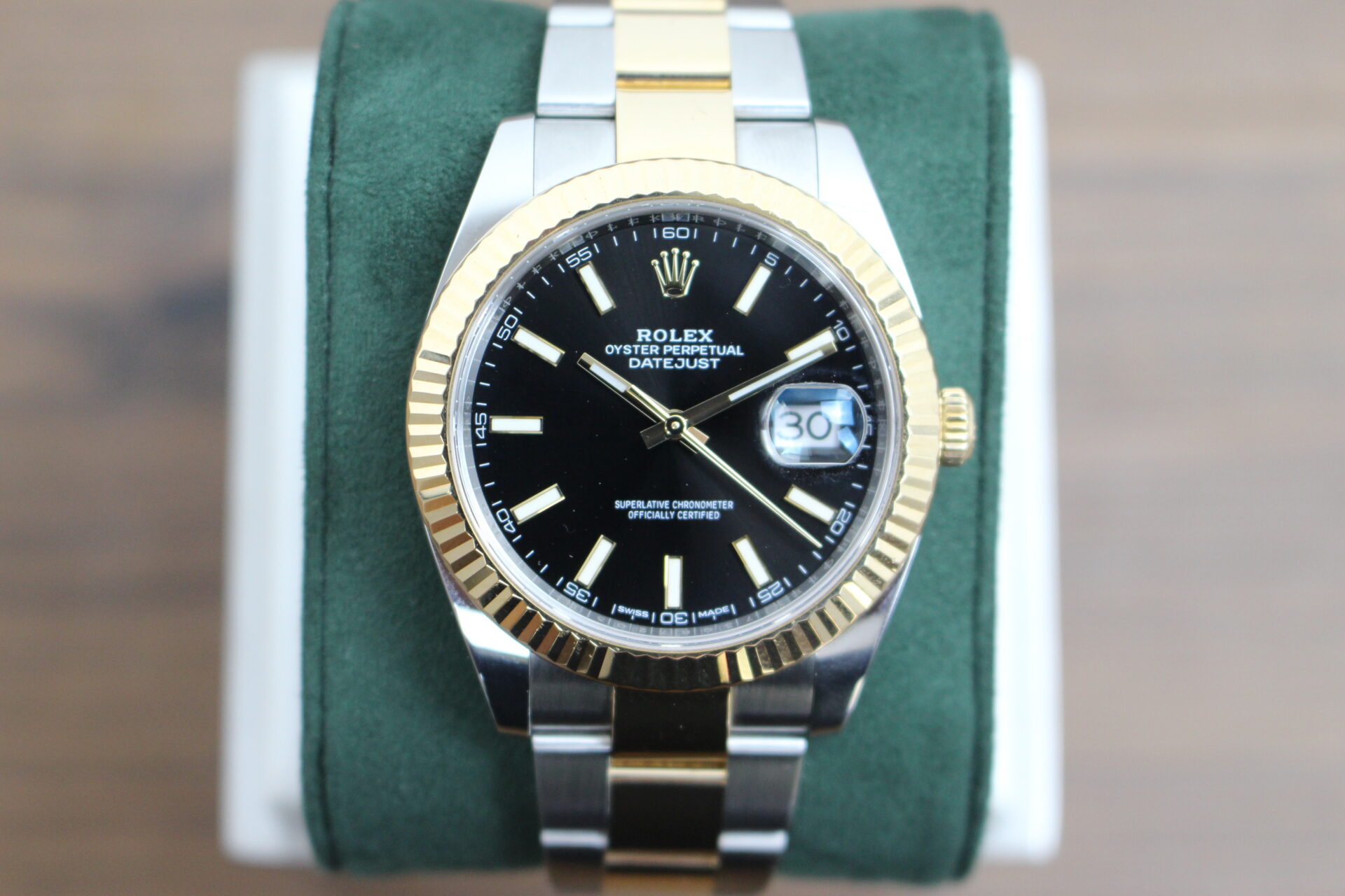Rolex Datejust 41mm 126333 on a green cushion